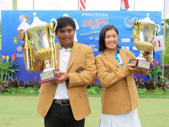 Champions Solomon Emilio Rosidin (left) and Ashley Lau with the TSM Golf Challenge trophies.